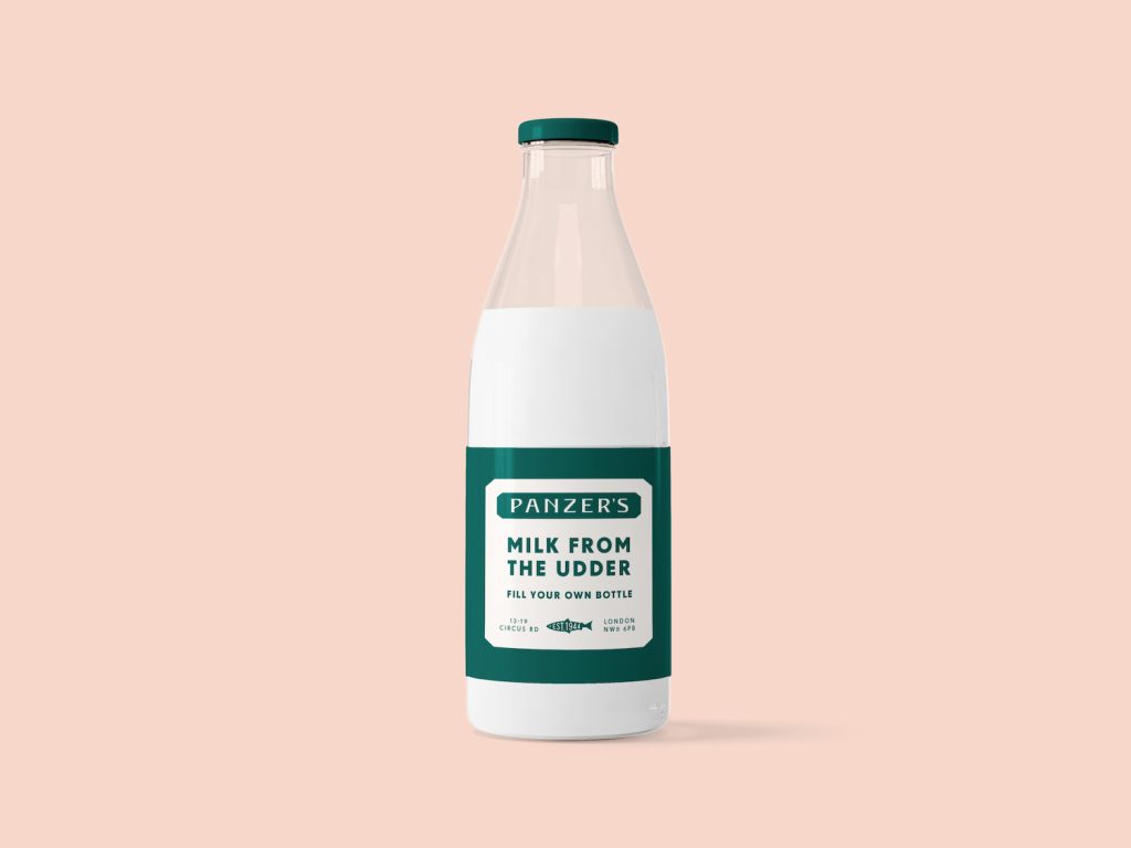 A Panzer's milk bottle with the label "Milk from the Udder"