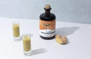 Kaveri cold pressed ginger vodka, poured into glasses