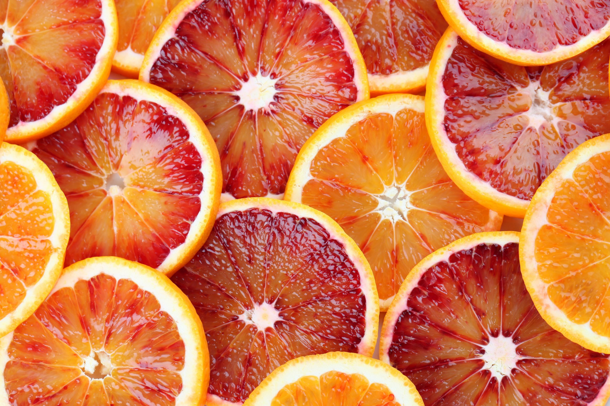 Slices of blood oranges in different shades