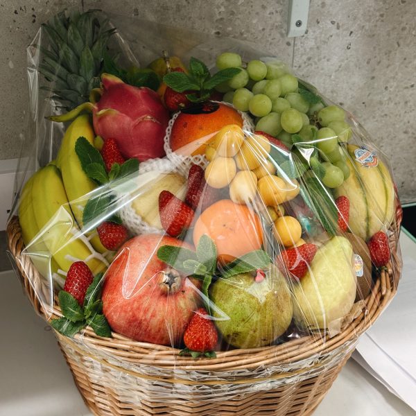 Fruit hamper gift in a wicker basket from Panzer's Deli