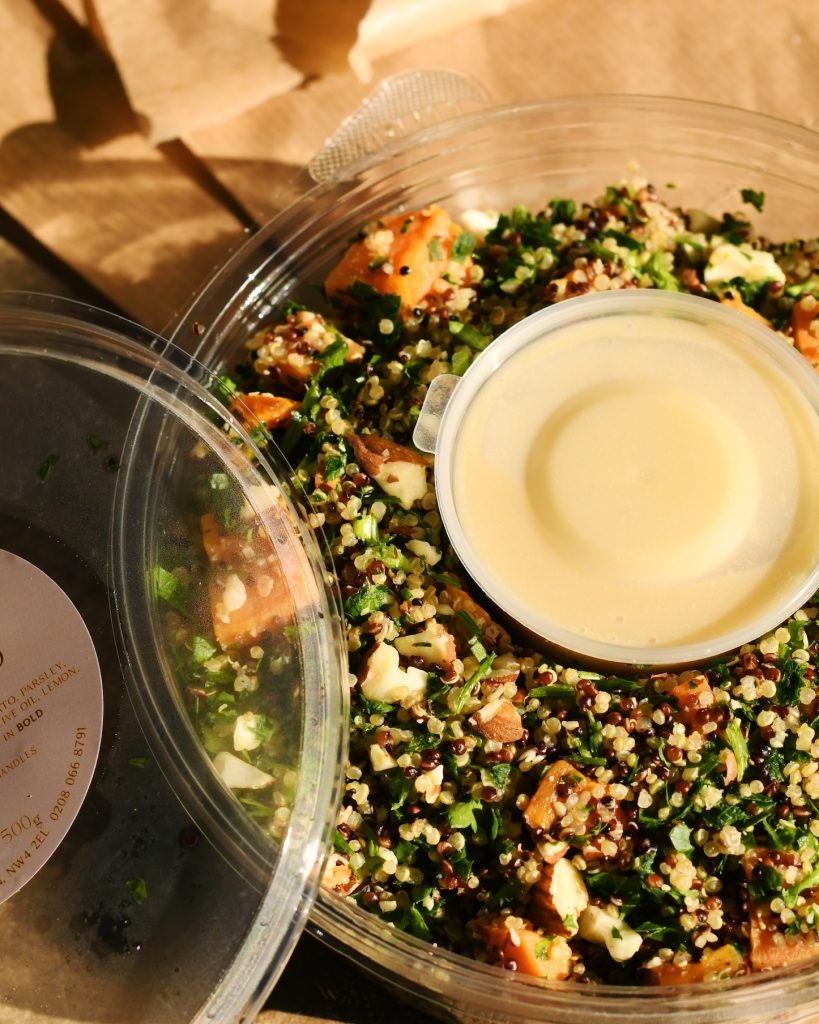 a bowl of Ayelet's kosher quinoa salad with dressing