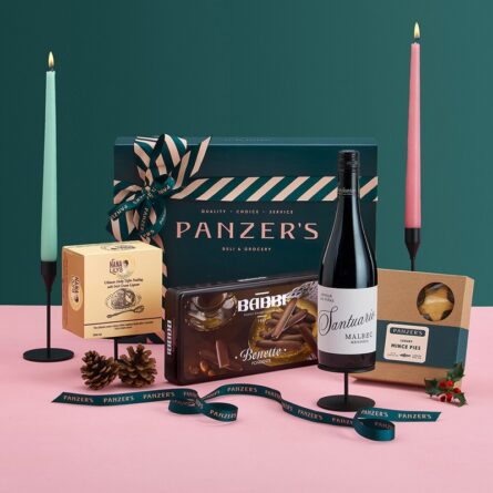 Festive Fayre Christmas hamper with a selection of gourmet festive foods, treats, and drinks, presented in a luxurious gift box with Panzer’s ribbon.