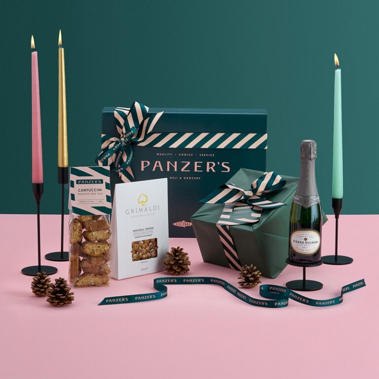 Buone Feste Christmas hamper with Italian festive foods, wine, and gourmet treats, presented in a luxurious gift box with Panzer’s ribbon.